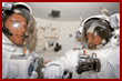  Parazynski and Titov in their extravehicular mobility units (EMU) 